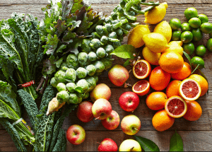 a group of fruits and vegetables on a wood surface Healthy Weight Loss Diets Ravensthorpe